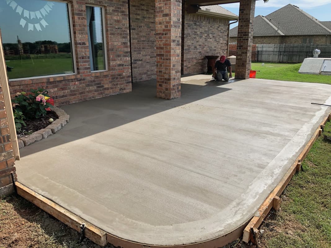 Fresh concrete patio being finished